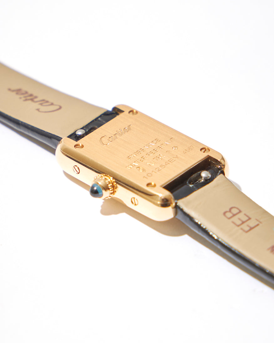 The sapphire on the top of the crown is an accent, and the brand name is engraved on the case back.