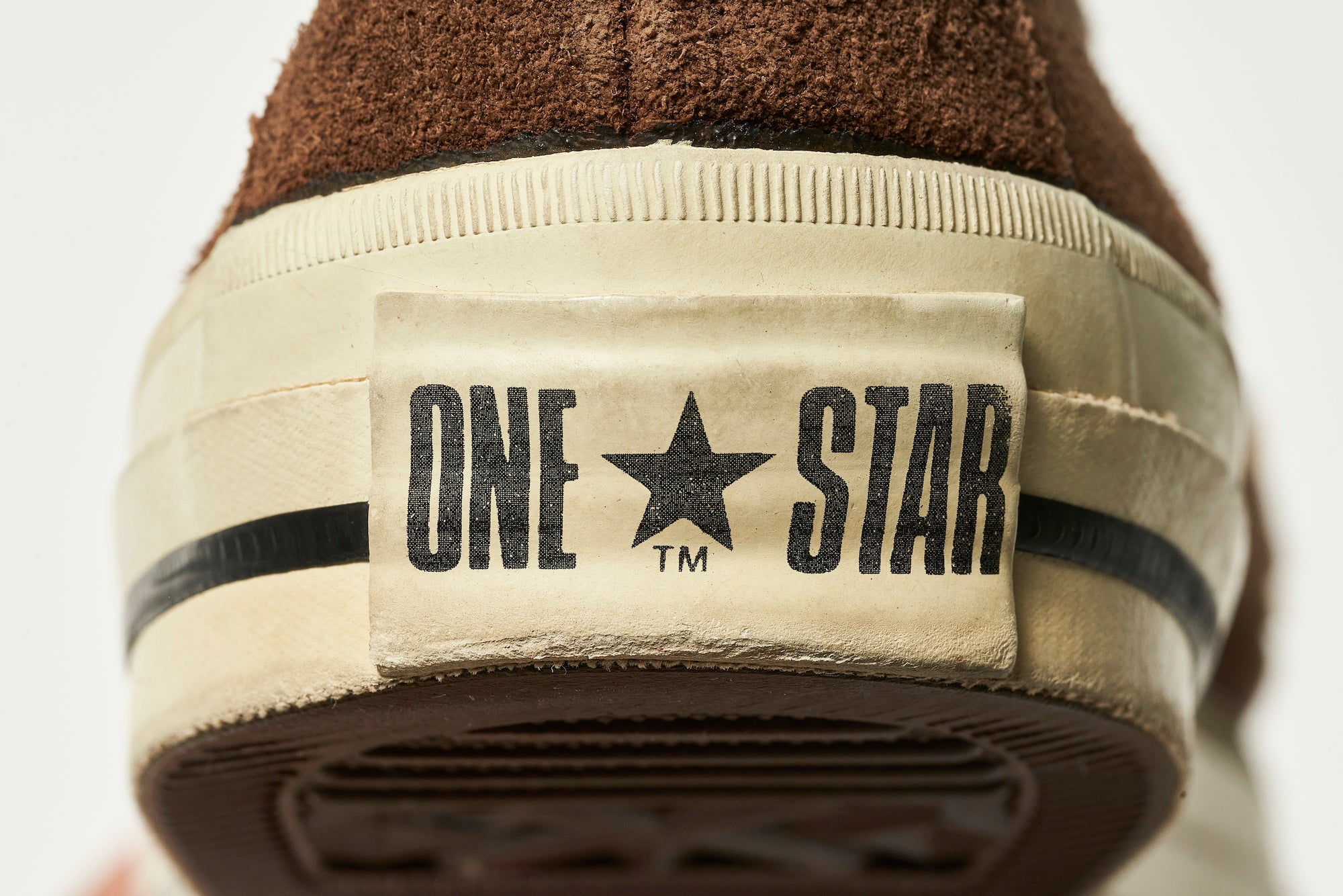 The heel label is the same as the regular One Star, with the TM notation underneath the star.