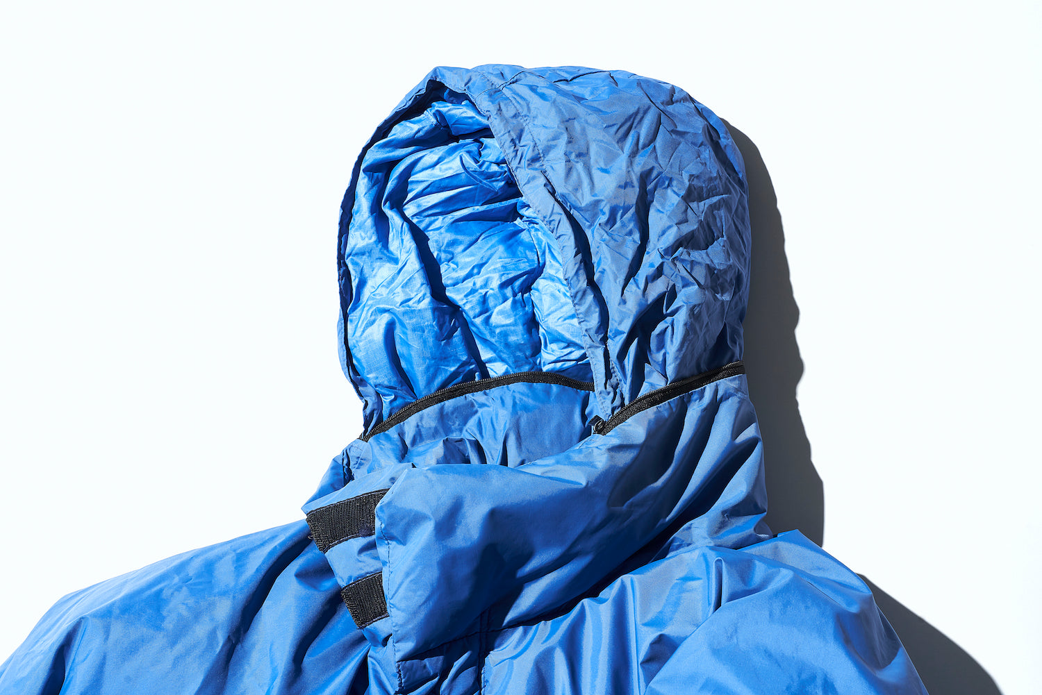 The retractable hood on the stand-up collar was a novel idea at the time.