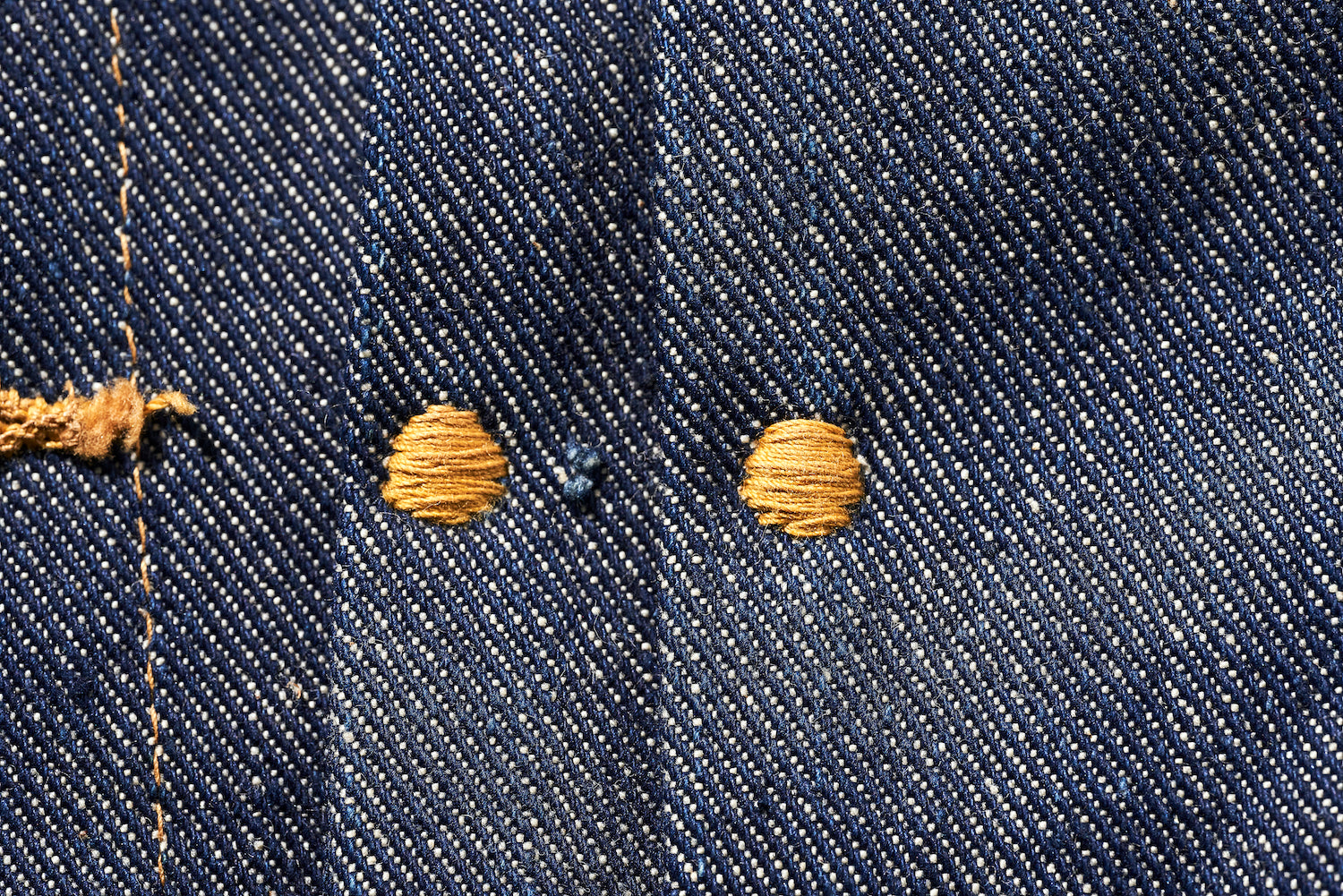 The front features two pleats, which can also be seen on denim jackets made by other companies.