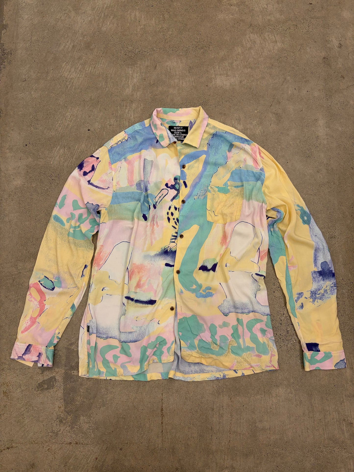 M/SF/Tのシャツ