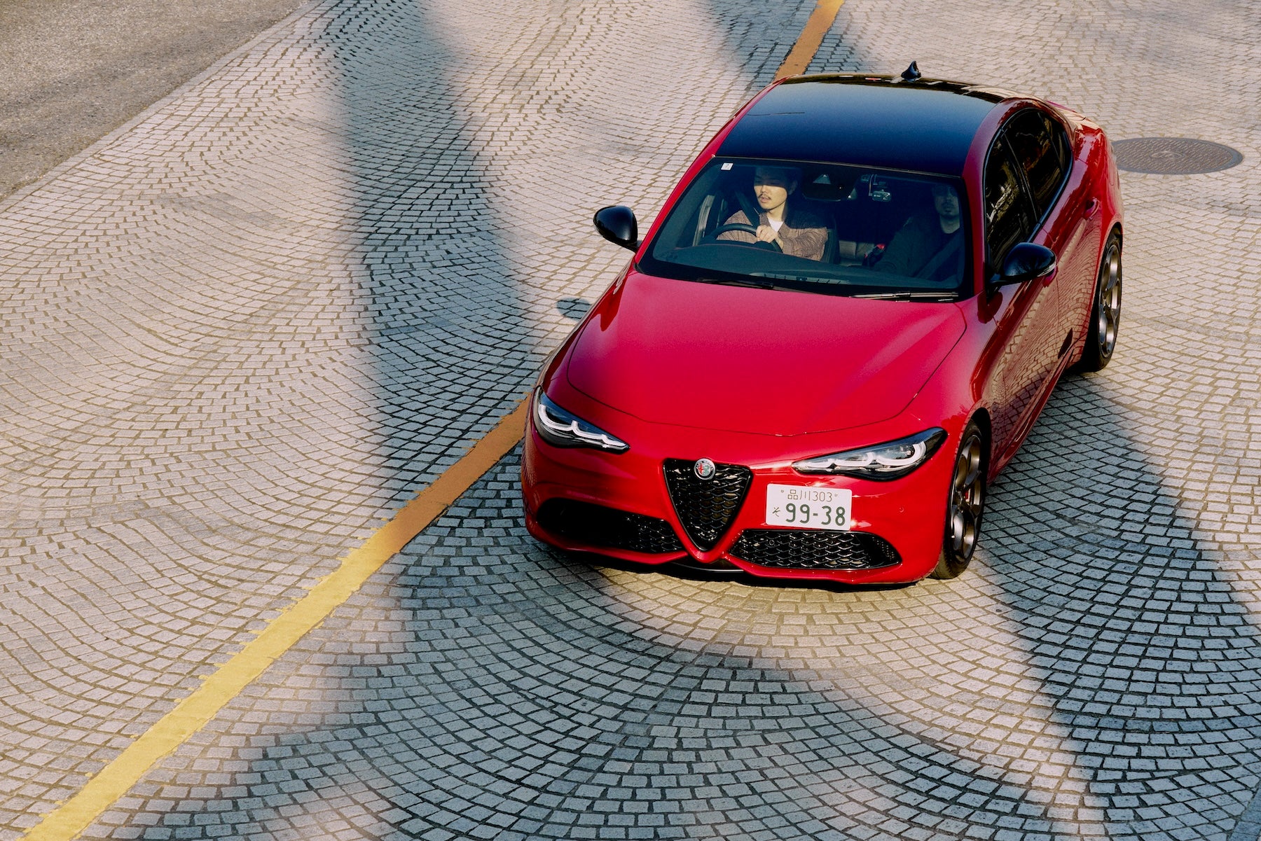 The body color is inspired by the Italian flag, and a black roof gives it a sportier look.