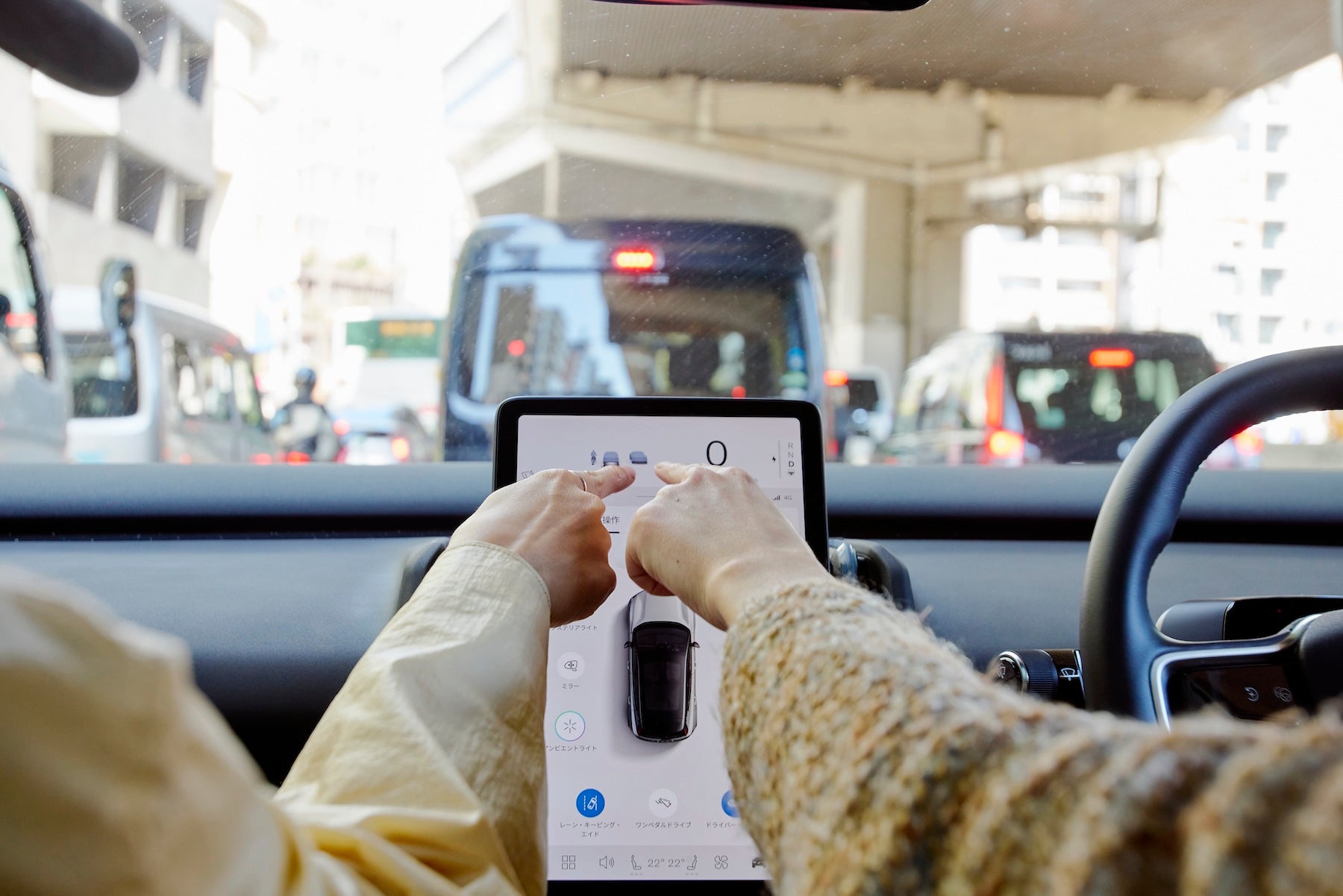 Information shown while driving, such as the speedometer, is integrated into the center display, creating a simple and minimalist cabin.