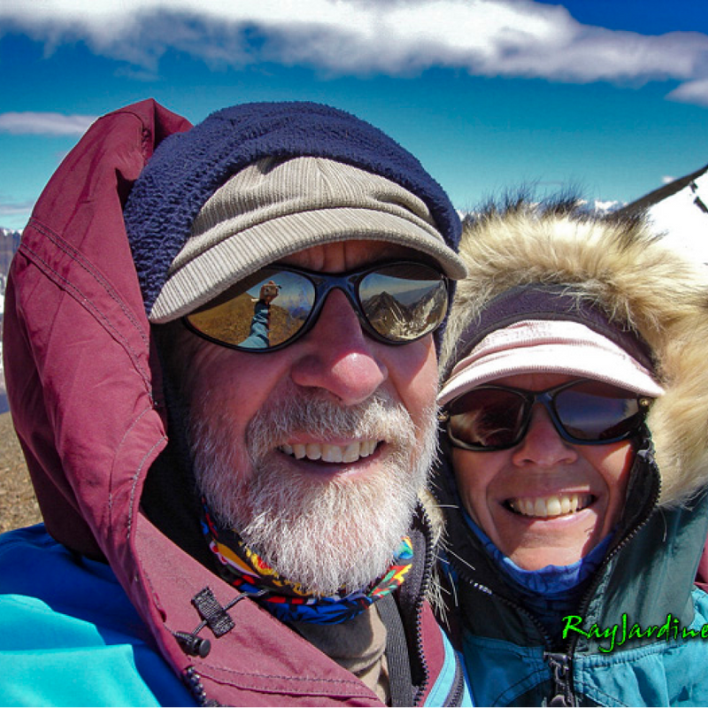 A photo of him and his wife, Jenny, smiling broadly at an altitude of 17,119 feet.