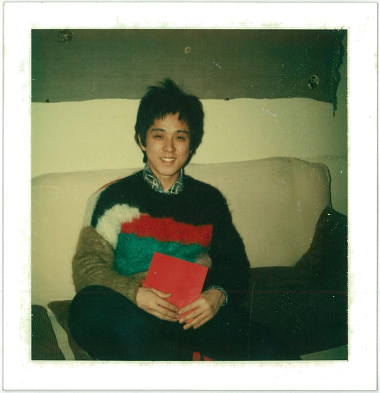 In a photo taken in the late 1970s, likely at home, she is seen wearing a SEX (later Seditionaries) sweater, which she still owns.